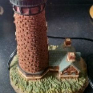 Hand painted porcelain illuminated lighthouse 12 1/2" tall x 8" wide